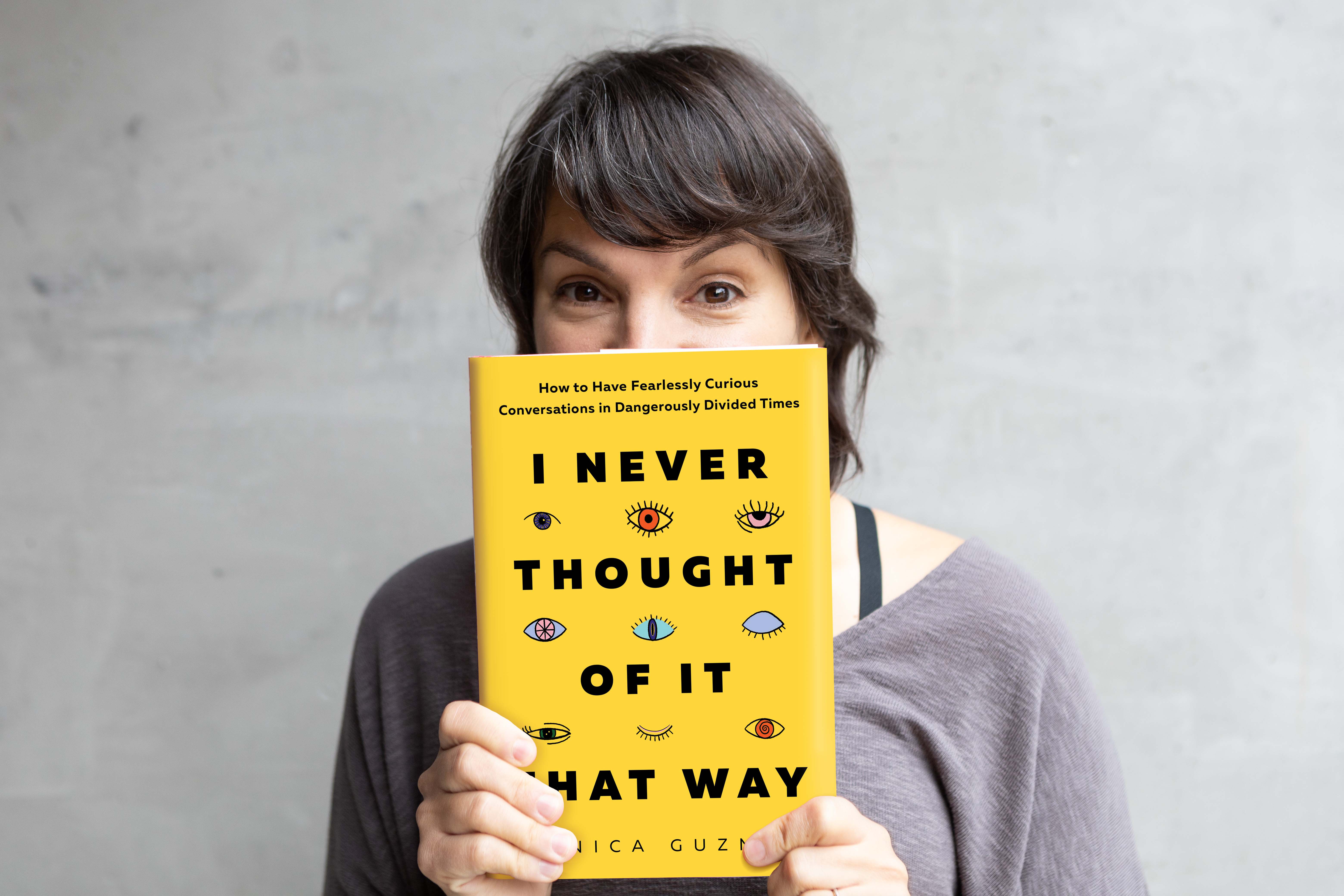 Monica Guzman with her book "I Never Thought of It That Way"